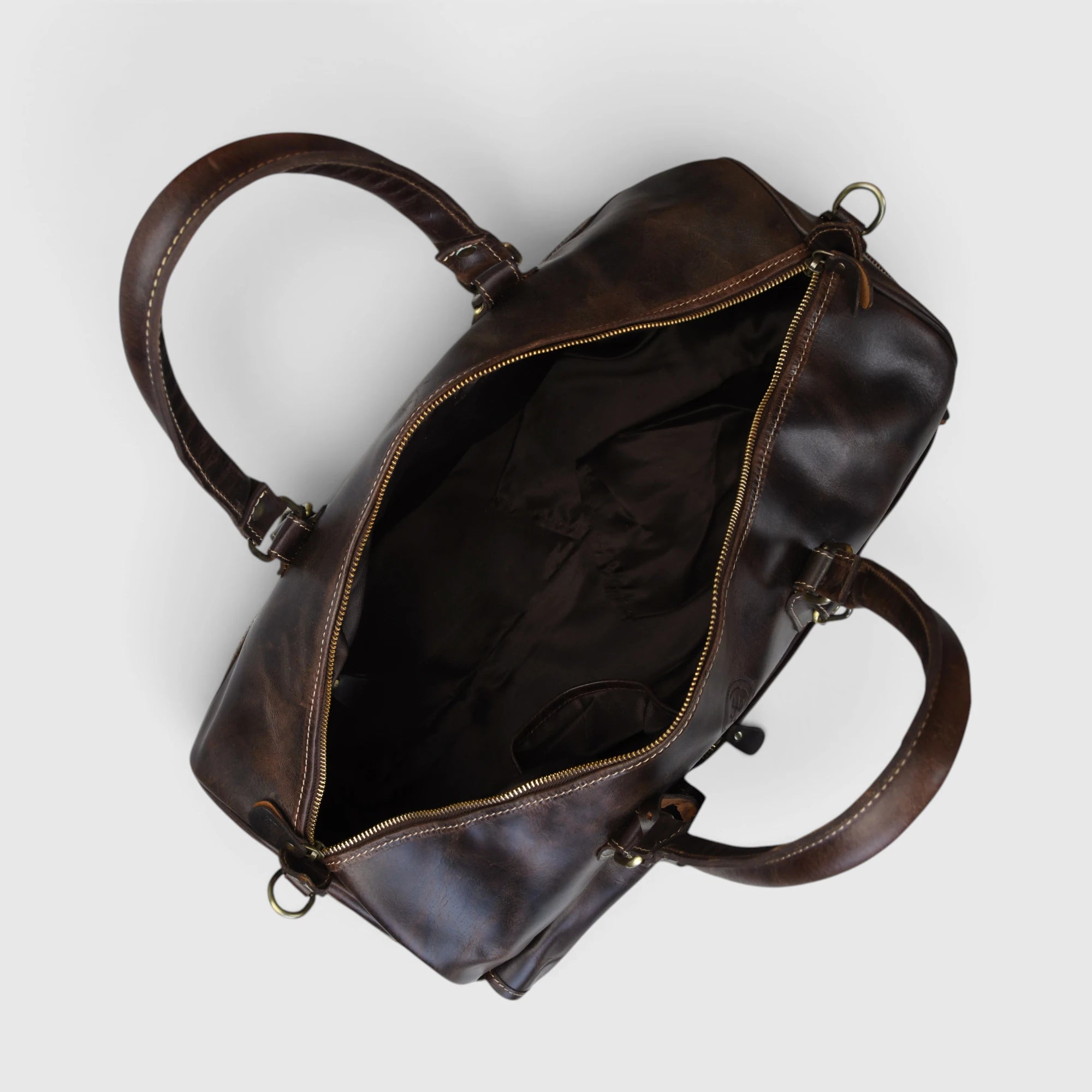 Open top view of The Odyssey Leather Travel Duffle interior
